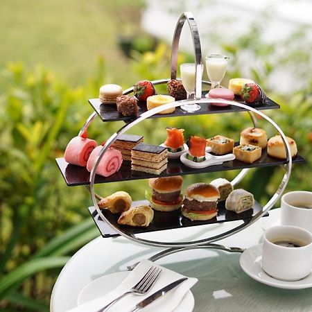 Grand Coloane Resort Macao Exteriér fotografie Afternoon tea at the InterContinental Sanctuary Cove Resort, Queensland, Australia